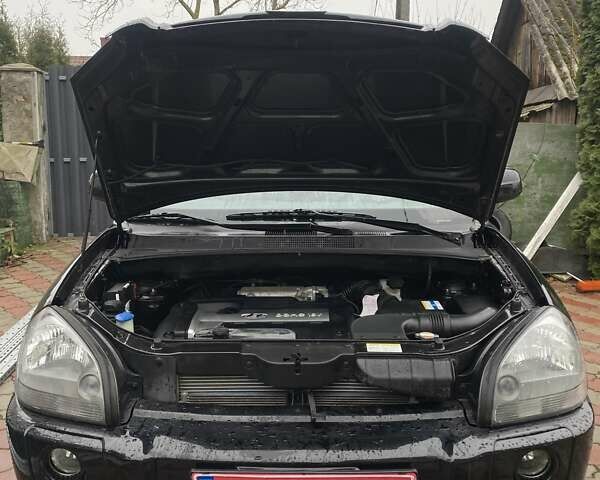 Чорний Хендай Туксон, об'ємом двигуна 1.98 л та пробігом 202 тис. км за 7350 $, фото 29 на Automoto.ua