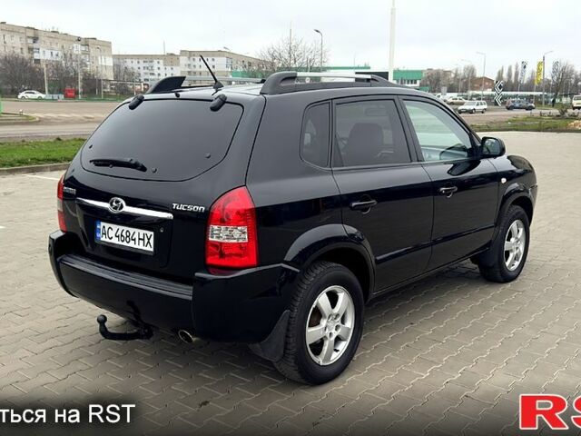 Черный Хендай Туксон, объемом двигателя 2 л и пробегом 200 тыс. км за 7800 $, фото 6 на Automoto.ua