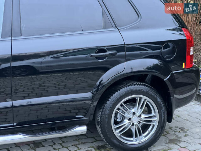 Чорний Хендай Туксон, об'ємом двигуна 1.98 л та пробігом 170 тис. км за 6999 $, фото 14 на Automoto.ua