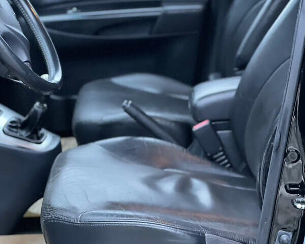 Чорний Хендай Туксон, об'ємом двигуна 1.98 л та пробігом 170 тис. км за 6999 $, фото 52 на Automoto.ua