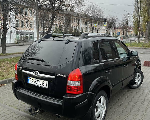 Черный Хендай Туксон, объемом двигателя 2 л и пробегом 242 тыс. км за 6999 $, фото 9 на Automoto.ua