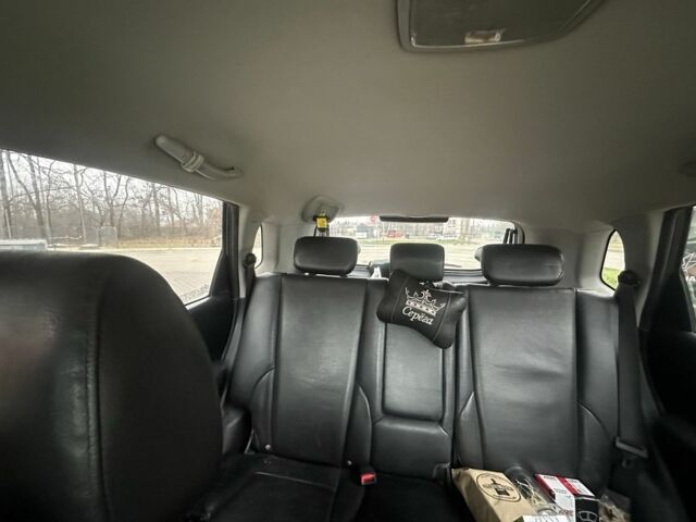 Черный Хендай Туксон, объемом двигателя 2 л и пробегом 174 тыс. км за 8000 $, фото 5 на Automoto.ua