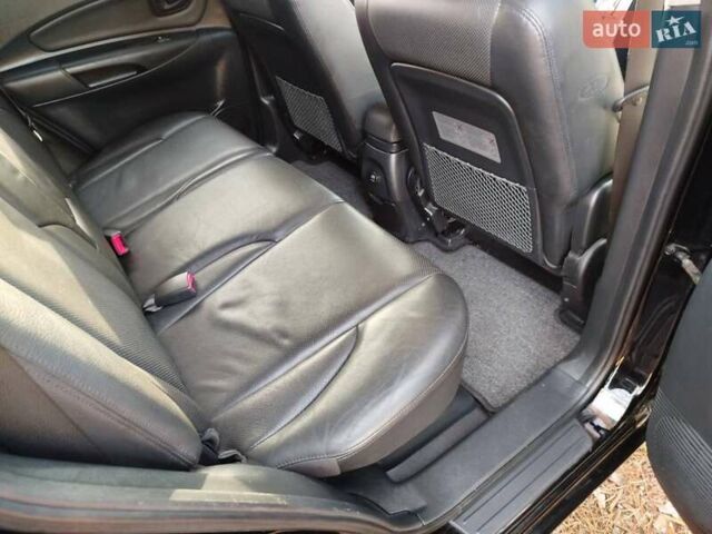 Черный Хендай Туксон, объемом двигателя 2 л и пробегом 195 тыс. км за 8300 $, фото 9 на Automoto.ua