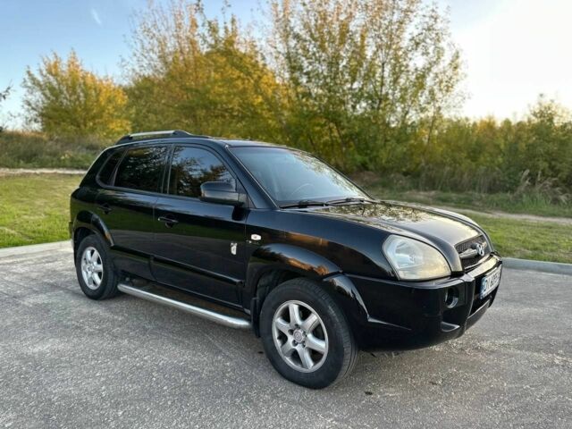 Чорний Хендай Туксон, об'ємом двигуна 2 л та пробігом 235 тис. км за 6700 $, фото 1 на Automoto.ua