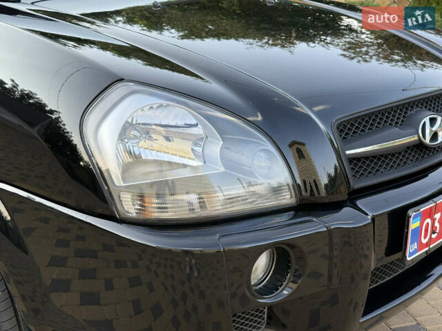 Чорний Хендай Туксон, об'ємом двигуна 1.98 л та пробігом 212 тис. км за 8200 $, фото 47 на Automoto.ua