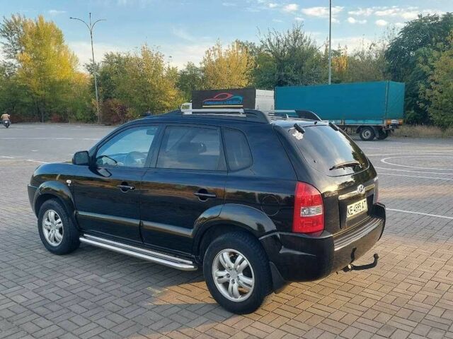 Чорний Хендай Туксон, об'ємом двигуна 2 л та пробігом 228 тис. км за 7800 $, фото 3 на Automoto.ua