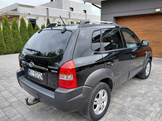 Черный Хендай Туксон, объемом двигателя 2 л и пробегом 233 тыс. км за 7000 $, фото 5 на Automoto.ua