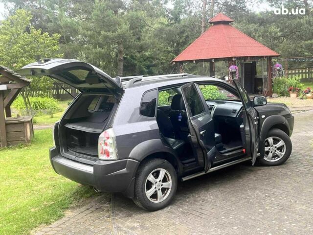 Черный Хендай Туксон, объемом двигателя 2.2 л и пробегом 230 тыс. км за 2300 $, фото 6 на Automoto.ua