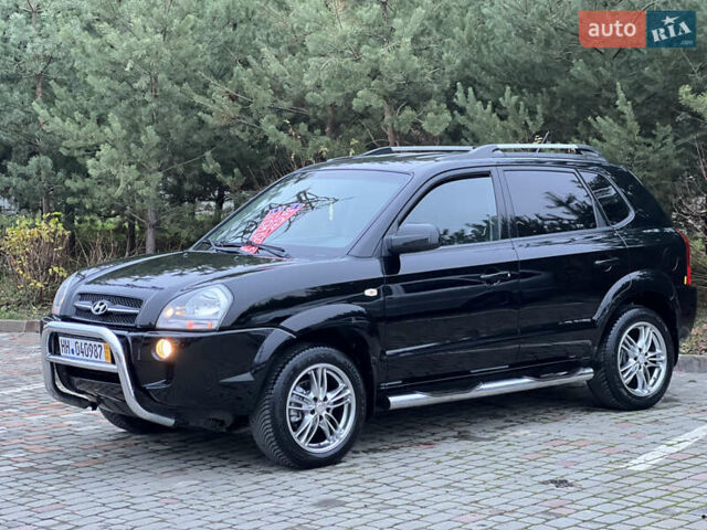 Чорний Хендай Туксон, об'ємом двигуна 1.98 л та пробігом 170 тис. км за 6999 $, фото 27 на Automoto.ua