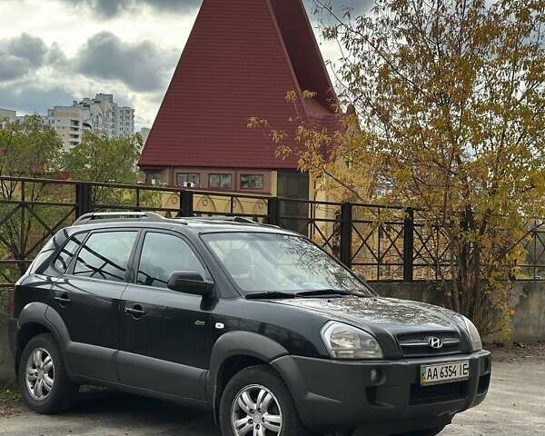 Черный Хендай Туксон, объемом двигателя 2.01 л и пробегом 246 тыс. км за 7400 $, фото 3 на Automoto.ua