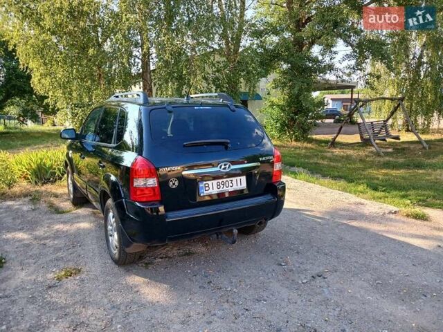 Чорний Хендай Туксон, об'ємом двигуна 1.98 л та пробігом 180 тис. км за 7600 $, фото 5 на Automoto.ua