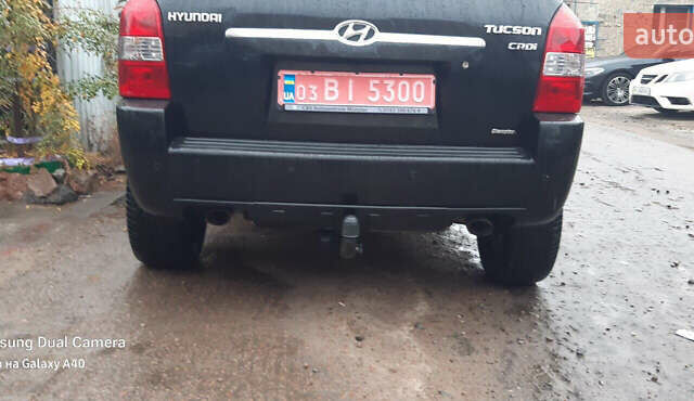 Чорний Хендай Туксон, об'ємом двигуна 1.99 л та пробігом 243 тис. км за 8850 $, фото 1 на Automoto.ua