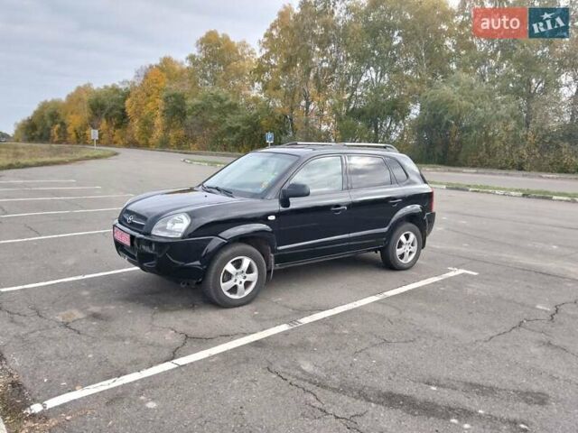 Черный Хендай Туксон, объемом двигателя 2 л и пробегом 127 тыс. км за 7590 $, фото 29 на Automoto.ua