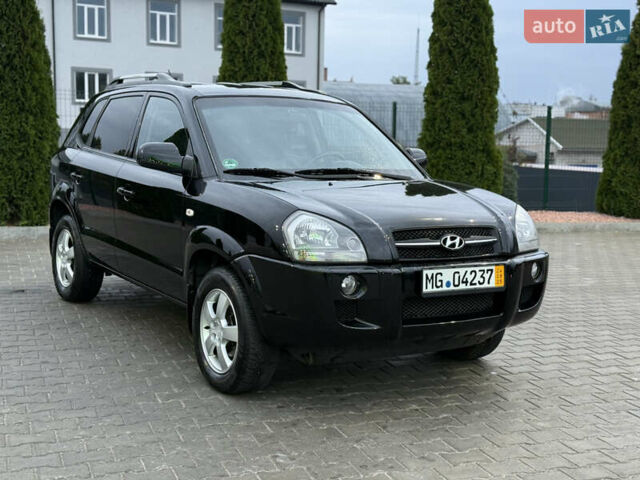 Чорний Хендай Туксон, об'ємом двигуна 2 л та пробігом 204 тис. км за 7750 $, фото 5 на Automoto.ua