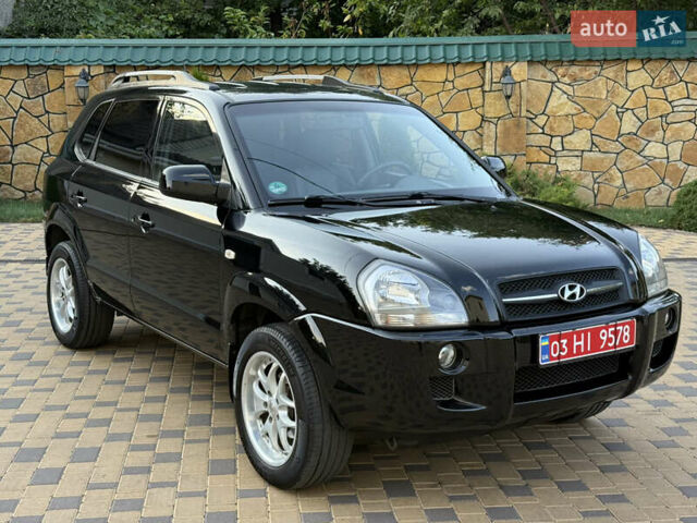 Чорний Хендай Туксон, об'ємом двигуна 1.98 л та пробігом 212 тис. км за 8200 $, фото 1 на Automoto.ua