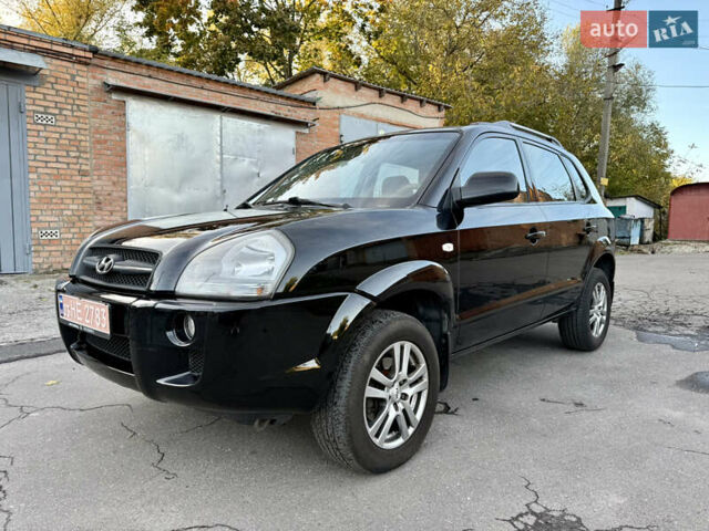 Черный Хендай Туксон, объемом двигателя 2 л и пробегом 189 тыс. км за 7150 $, фото 2 на Automoto.ua