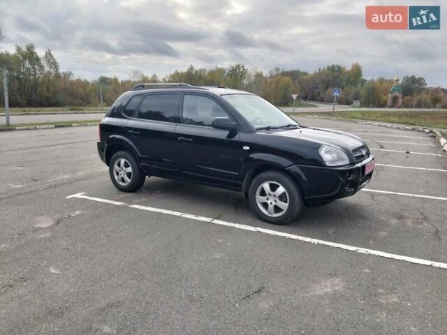 Черный Хендай Туксон, объемом двигателя 2 л и пробегом 127 тыс. км за 7590 $, фото 36 на Automoto.ua