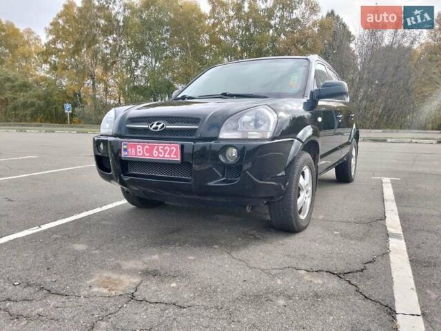 Черный Хендай Туксон, объемом двигателя 2 л и пробегом 127 тыс. км за 7590 $, фото 12 на Automoto.ua