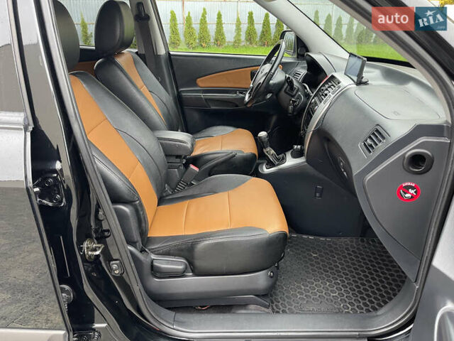 Черный Хендай Туксон, объемом двигателя 2 л и пробегом 216 тыс. км за 7500 $, фото 31 на Automoto.ua