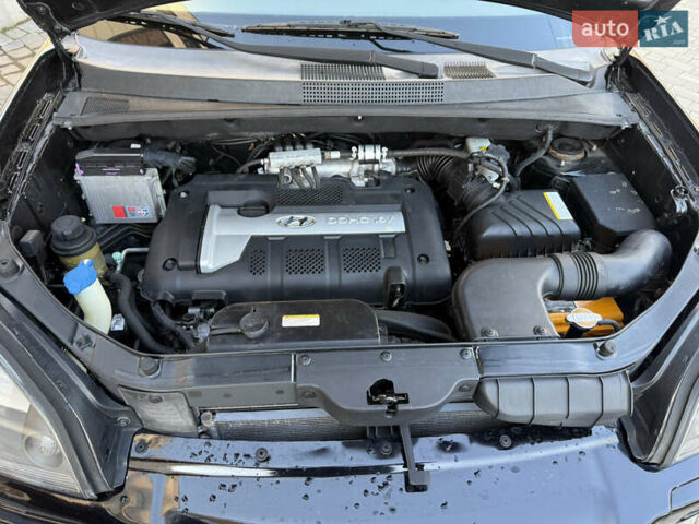 Черный Хендай Туксон, объемом двигателя 2 л и пробегом 249 тыс. км за 7450 $, фото 29 на Automoto.ua