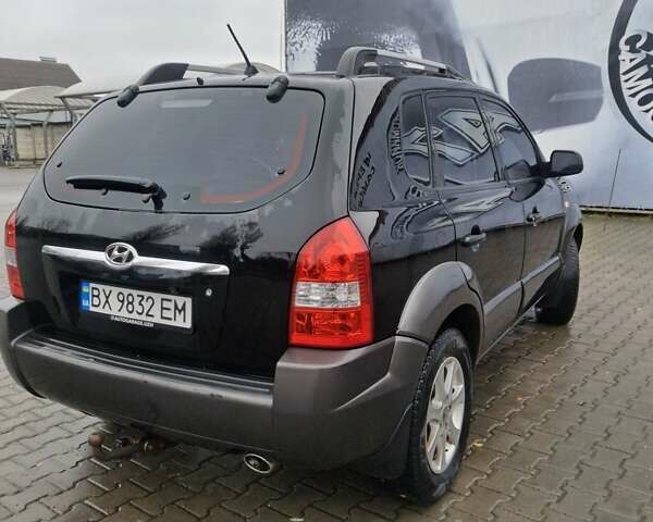 Чорний Хендай Туксон, об'ємом двигуна 2 л та пробігом 270 тис. км за 7500 $, фото 2 на Automoto.ua