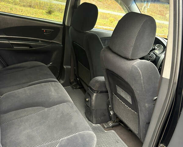 Хендай Туксон 2006 у Тернополі на Automoto.ua Чорний Хендай Туксон, об'ємом двигуна 1.99 л та пробігом 240 тис. км за 7600 $, фото 32 на Automoto.ua