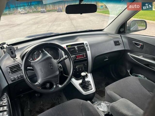 Чорний Хендай Туксон, об'ємом двигуна 2 л та пробігом 397 тис. км за 3900 $, фото 6 на Automoto.ua