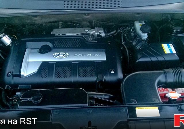 Черный Хендай Туксон, объемом двигателя 2 л и пробегом 260 тыс. км за 8000 $, фото 10 на Automoto.ua