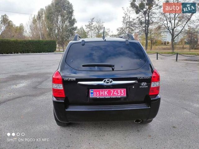 Черный Хендай Туксон, объемом двигателя 2 л и пробегом 237 тыс. км за 7999 $, фото 43 на Automoto.ua