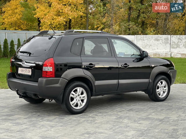 Черный Хендай Туксон, объемом двигателя 2 л и пробегом 216 тыс. км за 7500 $, фото 8 на Automoto.ua