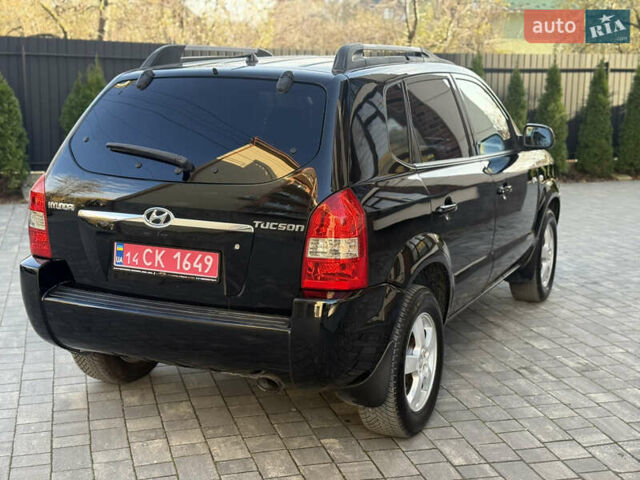 Черный Хендай Туксон, объемом двигателя 2 л и пробегом 249 тыс. км за 7450 $, фото 8 на Automoto.ua