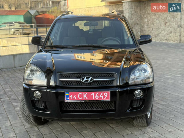 Черный Хендай Туксон, объемом двигателя 2 л и пробегом 249 тыс. км за 7450 $, фото 3 на Automoto.ua