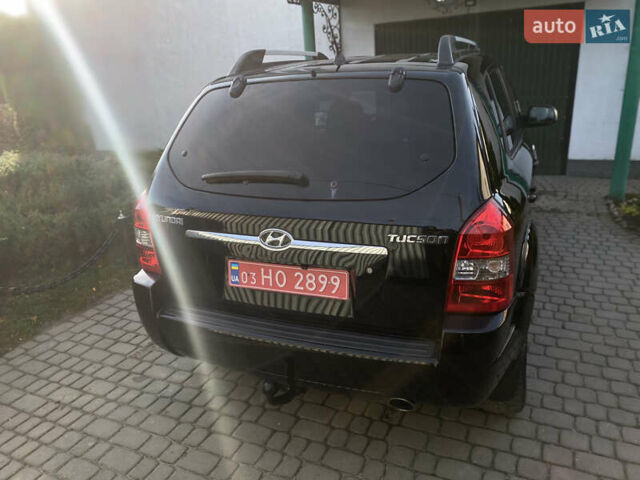 Чорний Хендай Туксон, об'ємом двигуна 1.98 л та пробігом 233 тис. км за 7650 $, фото 12 на Automoto.ua
