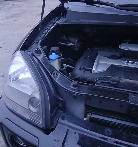 Чорний Хендай Туксон, об'ємом двигуна 1.98 л та пробігом 320 тис. км за 6500 $, фото 36 на Automoto.ua