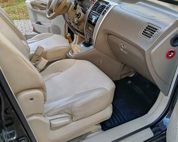 Черный Хендай Туксон, объемом двигателя 1.98 л и пробегом 256 тыс. км за 8000 $, фото 10 на Automoto.ua