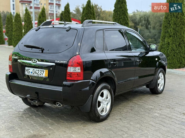 Чорний Хендай Туксон, об'ємом двигуна 2 л та пробігом 204 тис. км за 7750 $, фото 9 на Automoto.ua