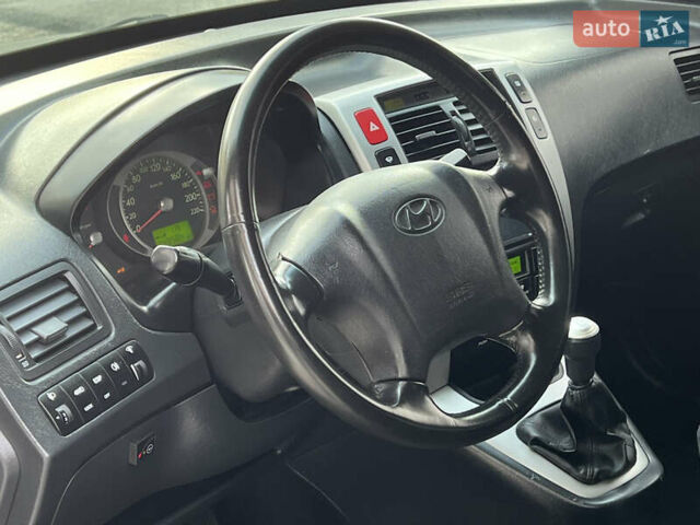 Хендай Туксон 2006 у Тернополі на Automoto.ua Чорний Хендай Туксон, об'ємом двигуна 2 л та пробігом 240 тис. км за 6699 $, фото 32 на Automoto.ua