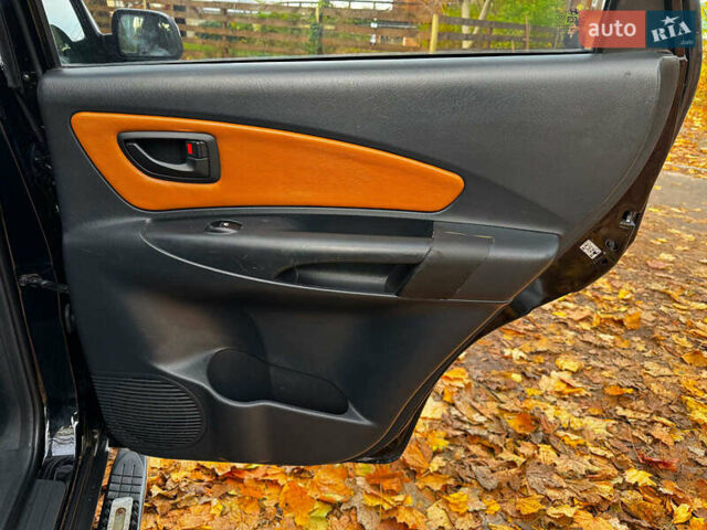 Черный Хендай Туксон, объемом двигателя 2 л и пробегом 210 тыс. км за 7990 $, фото 26 на Automoto.ua
