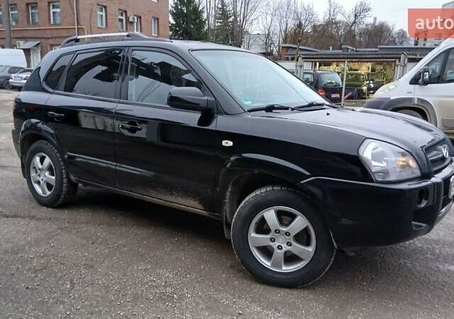 Чорний Хендай Туксон, об'ємом двигуна 1.98 л та пробігом 320 тис. км за 6500 $, фото 10 на Automoto.ua