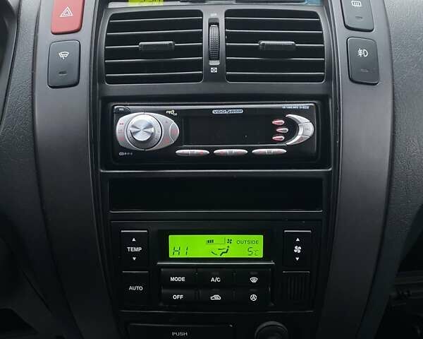 Чорний Хендай Туксон, об'ємом двигуна 1.98 л та пробігом 202 тис. км за 7350 $, фото 16 на Automoto.ua