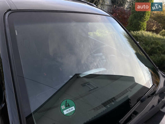 Чорний Хендай Туксон, об'ємом двигуна 1.98 л та пробігом 233 тис. км за 7650 $, фото 24 на Automoto.ua