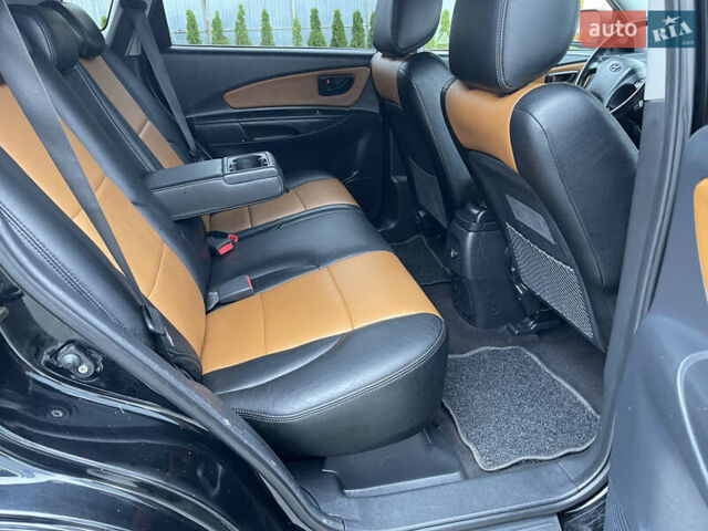 Черный Хендай Туксон, объемом двигателя 2 л и пробегом 216 тыс. км за 7700 $, фото 27 на Automoto.ua