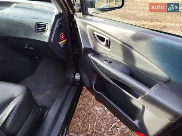 Черный Хендай Туксон, объемом двигателя 2 л и пробегом 195 тыс. км за 8300 $, фото 8 на Automoto.ua