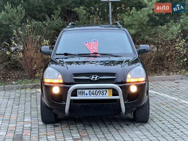 Чорний Хендай Туксон, об'ємом двигуна 1.98 л та пробігом 170 тис. км за 6999 $, фото 29 на Automoto.ua