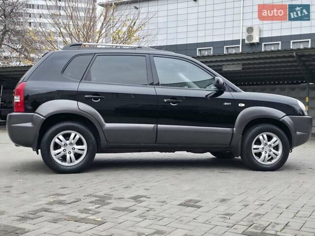 Чорний Хендай Туксон, об'ємом двигуна 1.98 л та пробігом 123 тис. км за 7950 $, фото 23 на Automoto.ua