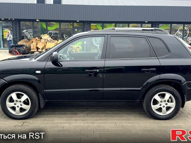 Черный Хендай Туксон, объемом двигателя 2 л и пробегом 200 тыс. км за 7800 $, фото 3 на Automoto.ua