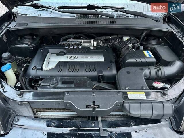 Чорний Хендай Туксон, об'ємом двигуна 2 л та пробігом 167 тис. км за 7950 $, фото 17 на Automoto.ua