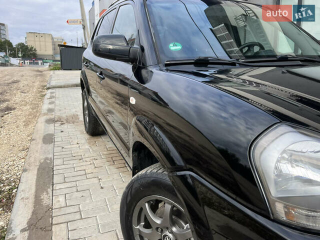 Чорний Хендай Туксон, об'ємом двигуна 2 л та пробігом 144 тис. км за 6599 $, фото 28 на Automoto.ua