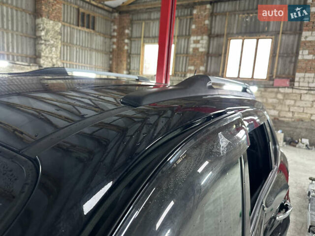 Чорний Хендай Туксон, об'ємом двигуна 2 л та пробігом 252 тис. км за 3000 $, фото 44 на Automoto.ua
