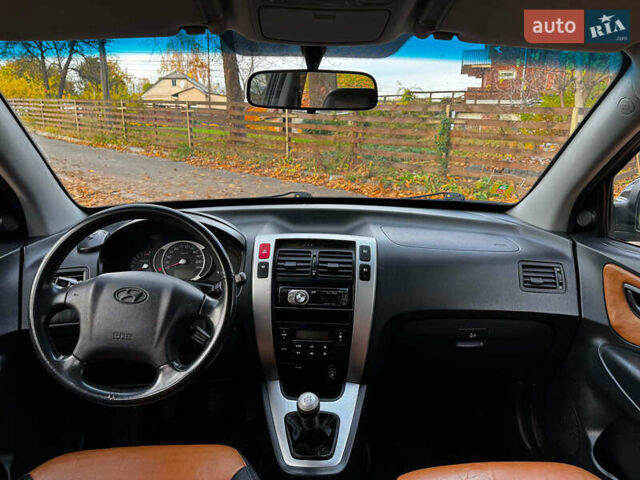 Черный Хендай Туксон, объемом двигателя 2 л и пробегом 210 тыс. км за 7990 $, фото 25 на Automoto.ua